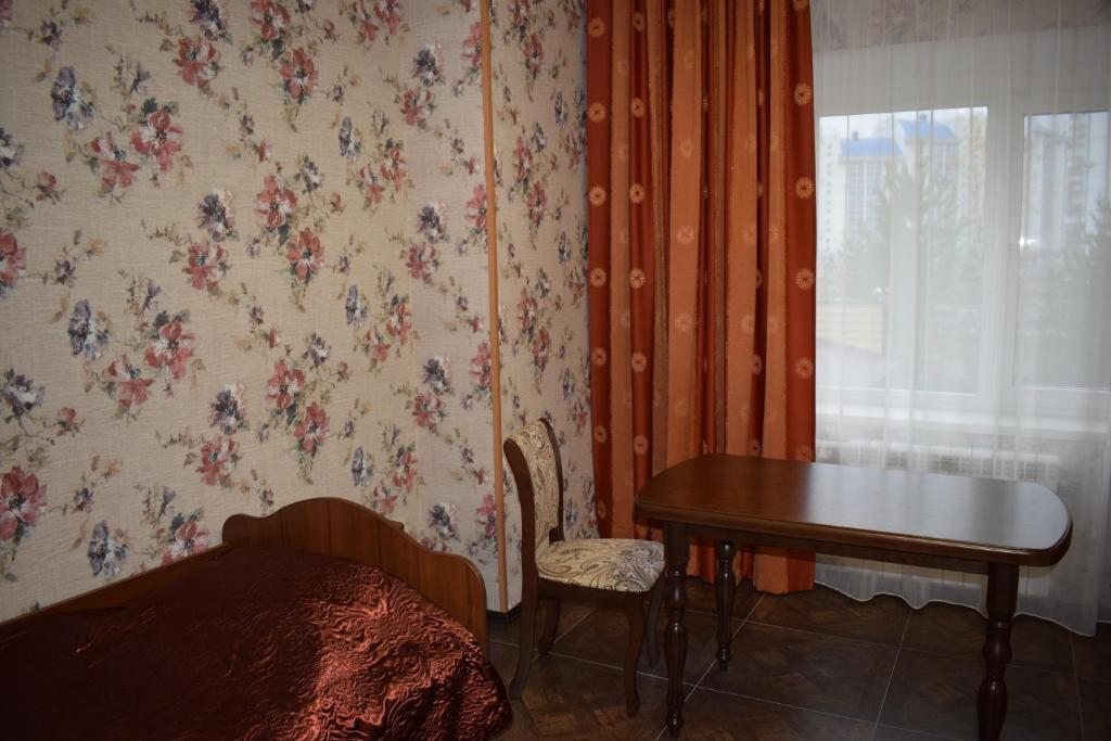 Двухместный (Стандартный двухместный номер с 2 отдельными кроватями) отеля Мини-отель на Чапаева 3, Нижневартовск