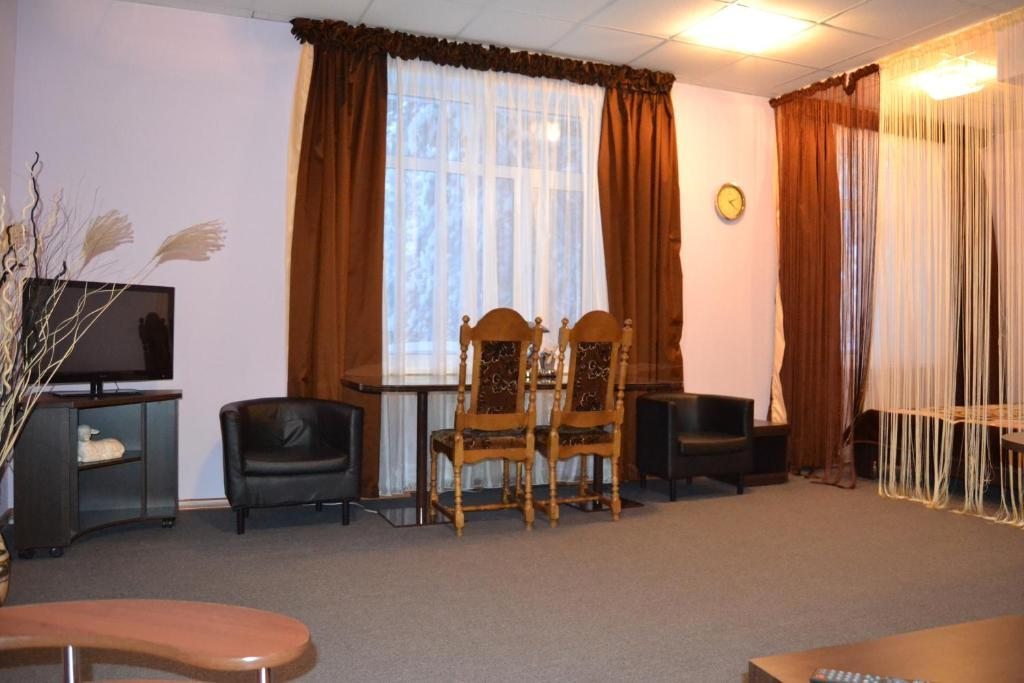 Двухместный (Двухместный номер Делюкс с 1 кроватью и дополнительной кроватью) отеля Белая гора, Ноябрьск
