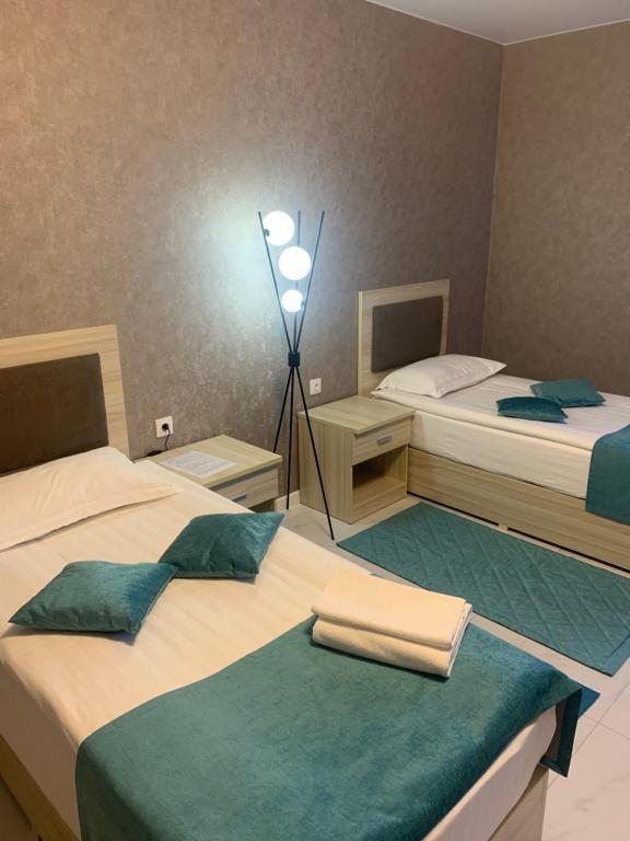 Двухместный (Улучшенный двухместный номер с 2 отдельными кроватями) отеля Белая Медведица, Ноябрьск