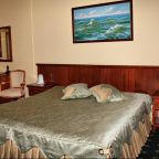 Номера отеля «Кедр» располагает кроватями разных размеров
