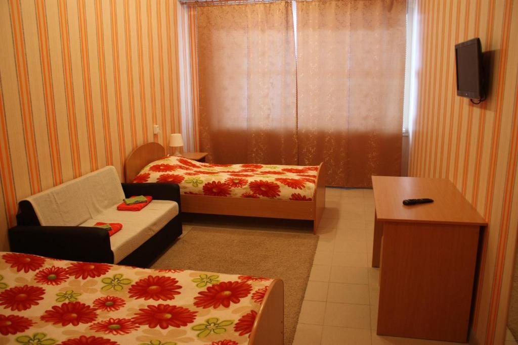 Двухместный (Двухместный номер эконом-класса с 2 отдельными кроватями) хостела Мини Отель Вояж, Петрозаводск