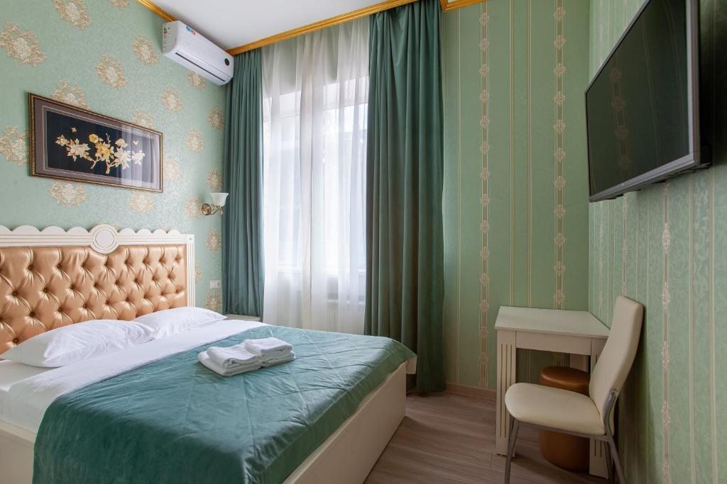 Двухместный (Большой двухместный номер с 1 кроватью) отеля Hotel Elux, Москва