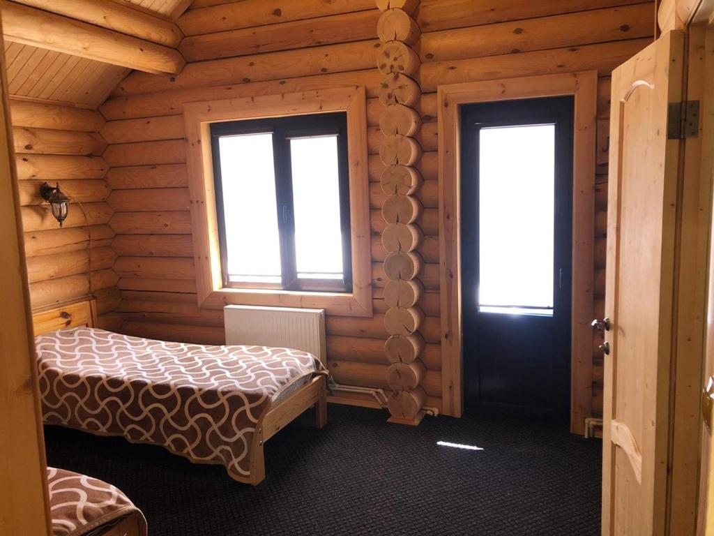 Двухместный (Двухместный номер с 2 отдельными кроватями и видом на горы) отеля Мухтар, Терскол