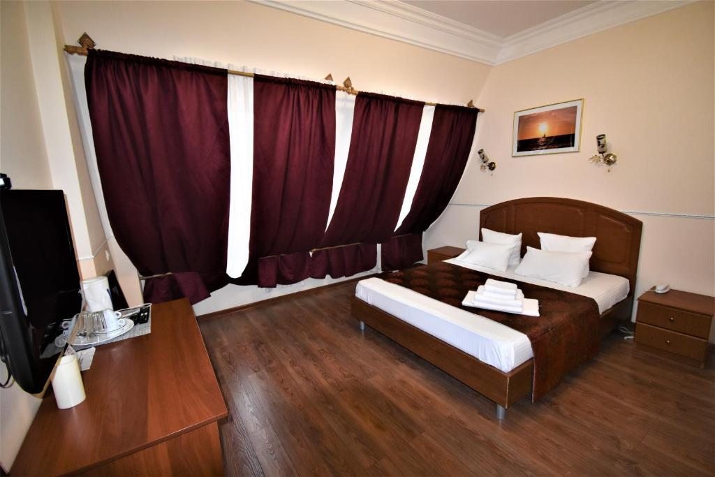 Двухместный (Улучшенный двухместный номер с 1 кроватью) отеля Сакра, Краснодар