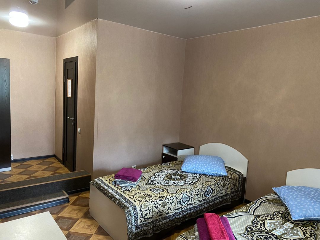Двухместный (Двухместный номер с двумя отдельными кроватями с собственной ванной комнатой) гостиницы Лидер, Якутск