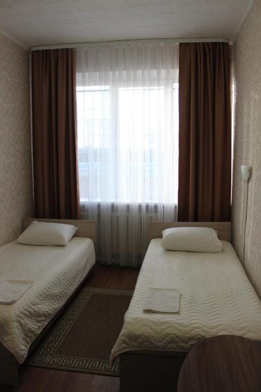 Двухместный (Двухместный номер с 2 отдельными кроватями) отеля Dinamo Hotel, Иркутск