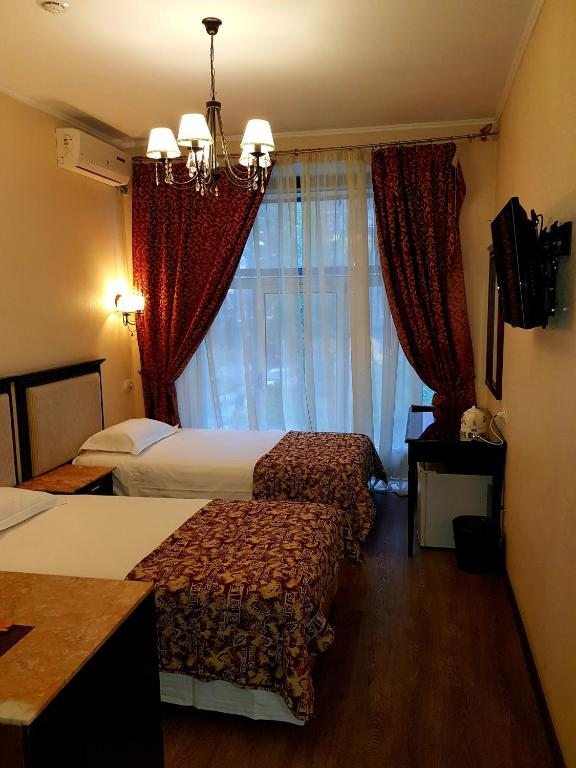 Двухместный (Двухместный номер «Комфорт» с 1 кроватью или 2 отдельными кроватями) отеля Happy Inn на Софийской, Санкт-Петербург