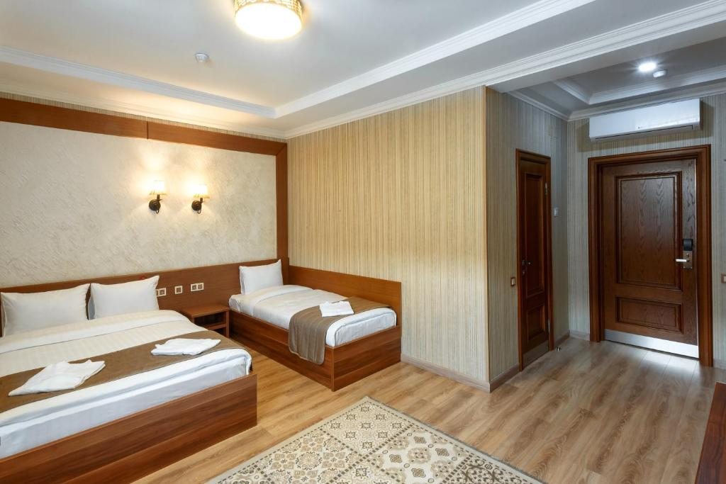 Семейный (Семейный номер) отеля Sacvoyage Hotel, Алматы