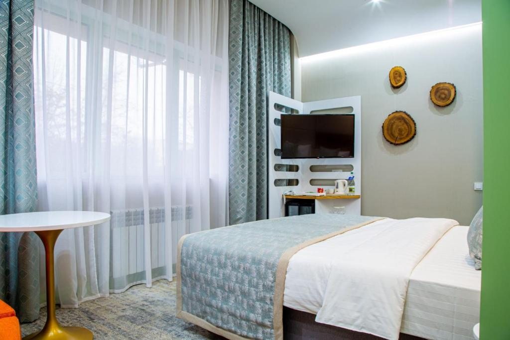 Двухместный (Стандартный двухместный номер с 1 кроватью или 2 отдельными кроватями) отеля Отель Казжол Парк, Алматы