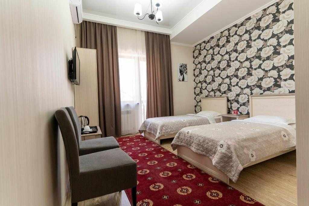 Двухместный (Двухместный номер с 2 отдельными кроватями) отеля Bastau Hotel, Алматы