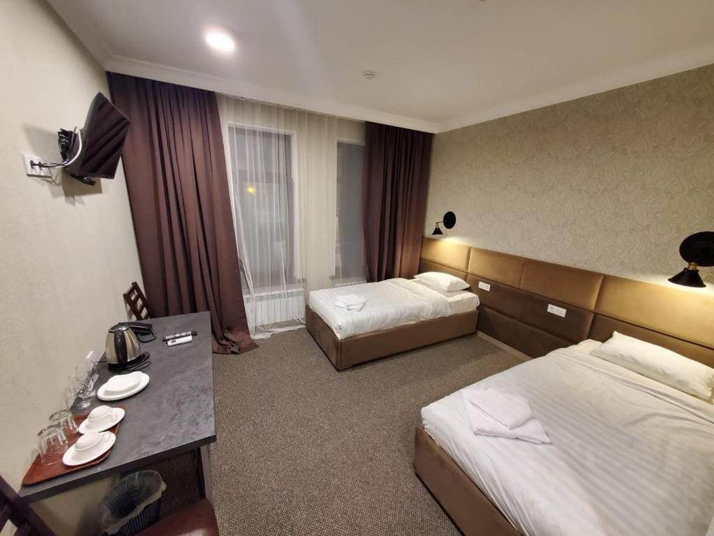 Двухместный (Двухместный номер с 2 отдельными кроватями) отеля Khan Hotel, Алматы