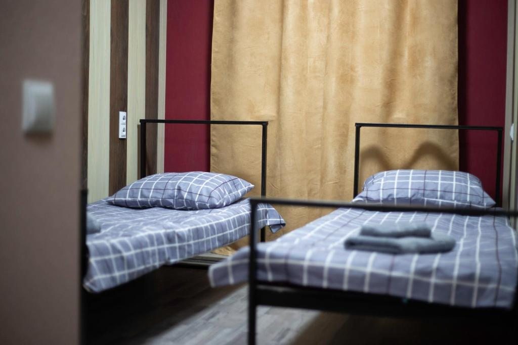 Двухместный (Двухместный номер с 2 отдельными кроватями) хостела Капсульный отель CAPSULA, Алматы