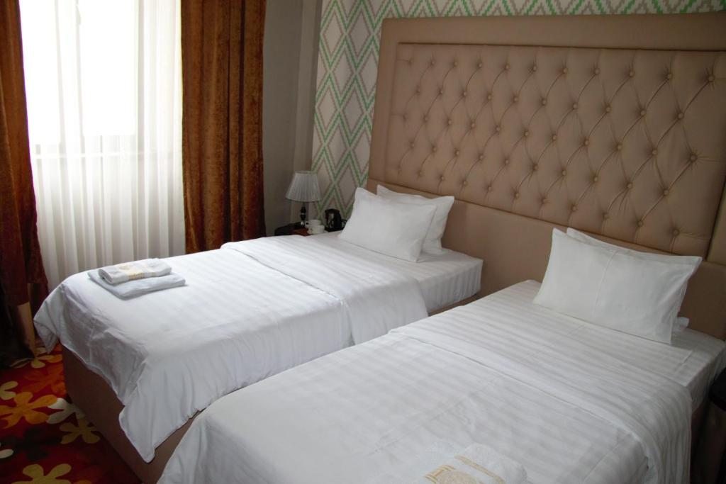 Двухместный (Двухместный номер с 2 отдельными кроватями) отеля Отель Сапар Делюкс, Алматы