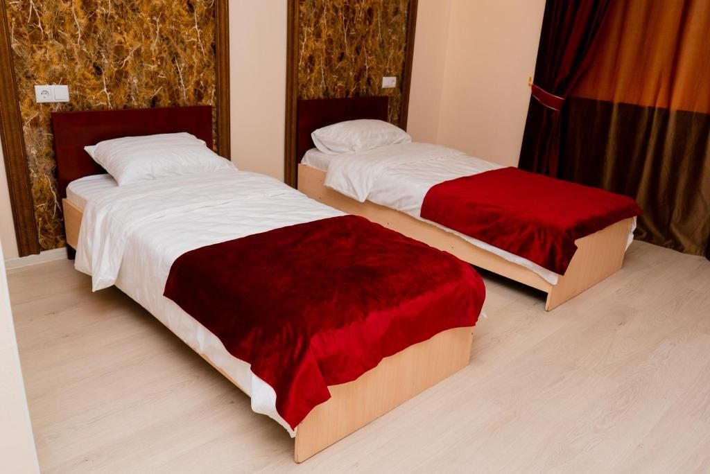 Двухместный (Двухместный номер Делюкс с 2 отдельными кроватями) отеля Antalya, Астана