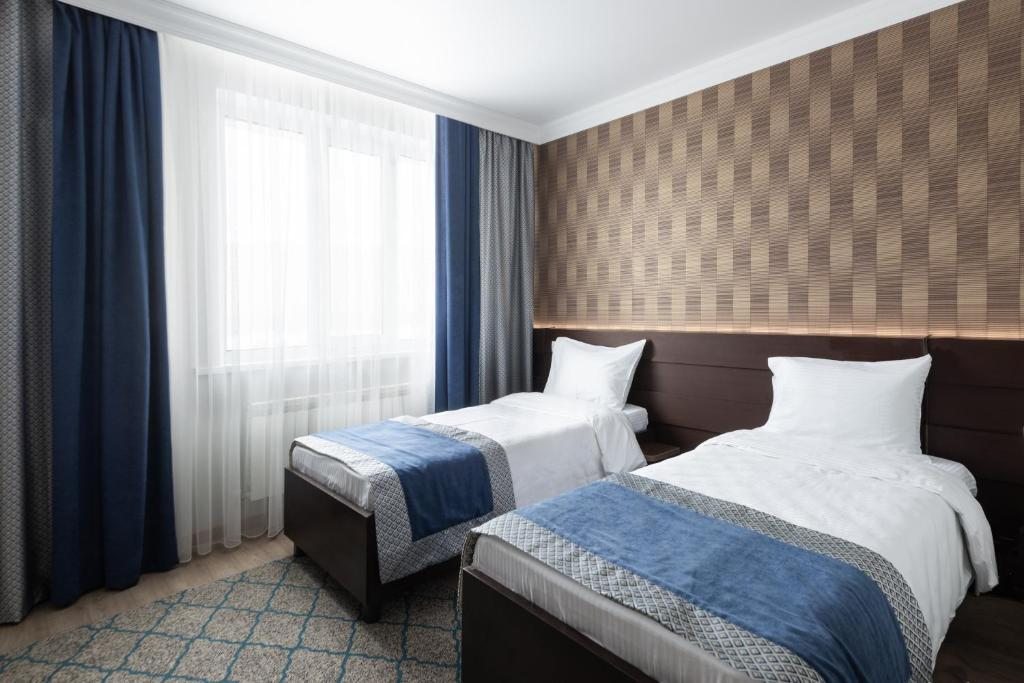 Двухместный (Двухместный номер с 2 отдельными кроватями) отеля NCityHotel, Астана