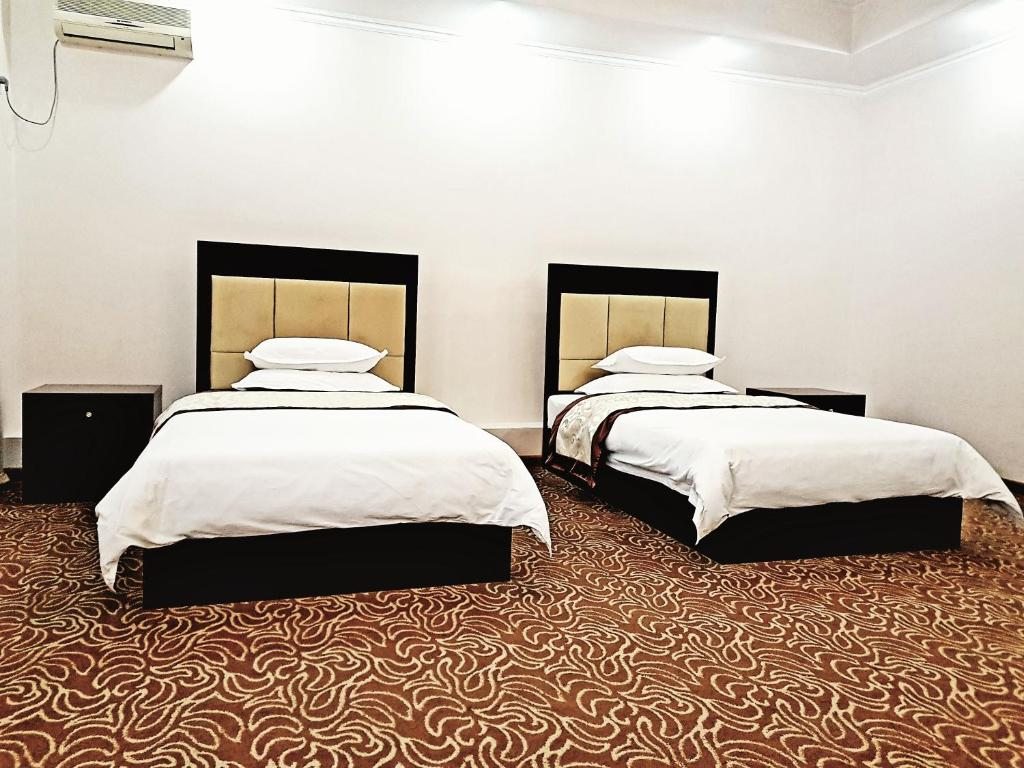 Двухместный (Двухместный номер с 2 отдельными кроватями и видом на город) отеля Porta Fortuna, Астана