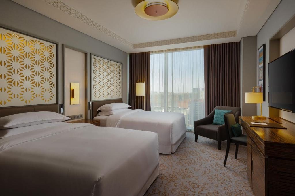 Двухместный (Двухместный номер Делюкс с 2 двуспальными кроватями) отеля Sheraton Astana Hotel, Астана