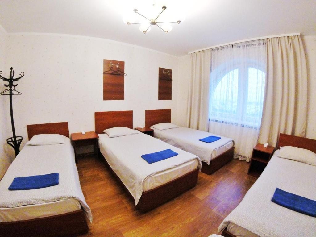 Номер (Кровать в общем 8-местном номере) гостевого дома Grand Inn, Минск