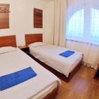 Номер (Кровать в общем номере с 4 кроватями), Гостевой дом Grand Inn