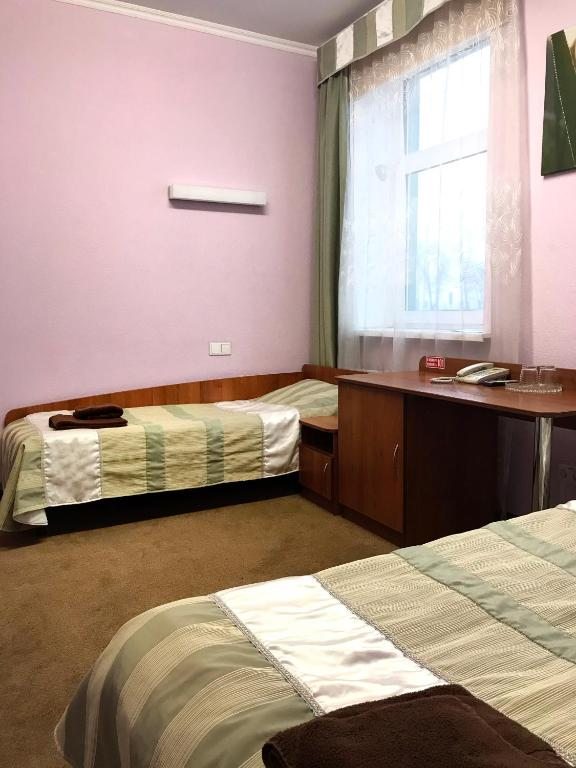 Двухместный (Двухместный номер с 2 отдельными кроватями и собственной ванной комнатой) отеля Белтаможсервис-Минск