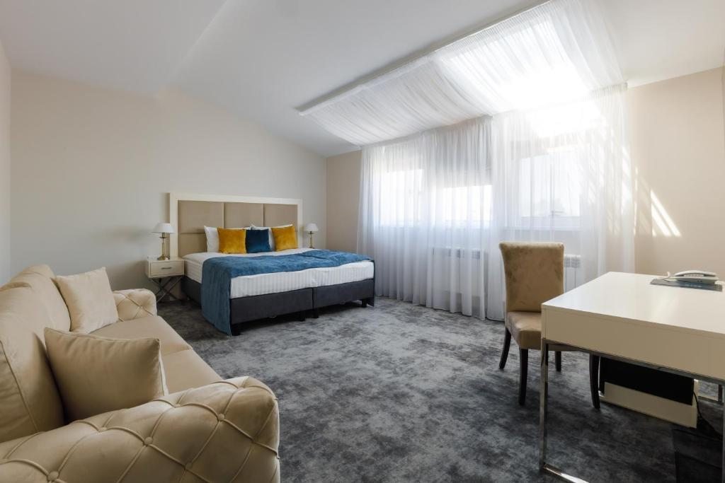 Двухместный (Улучшенный двухместный номер с 1 кроватью или 2 отдельными кроватями) отеля Апарт отель Семашко, Гродно
