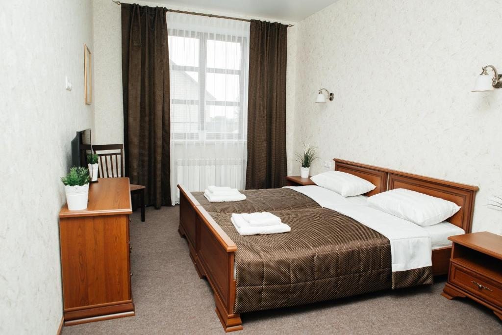 Двухместный (Стандартный двухместный номер с 2 отдельными кроватями) отеля Отель Беласток, Несвиж
