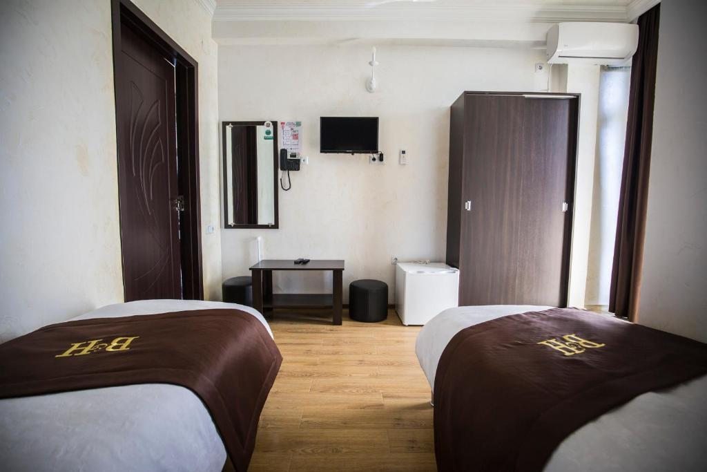 Двухместный (Двухместный номер с 2 отдельными кроватями) отеля Beach House Hotel, Батуми