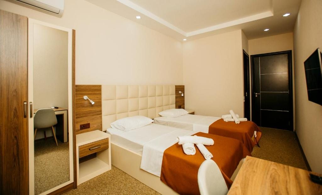 Двухместный (Стандартный двухместный номер с 2 отдельными кроватями) отеля City Hotel, Батуми
