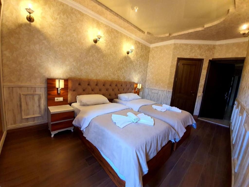 Двухместный (Двухместный номер с 2 отдельными кроватями) отеля Hotel MELINI, Батуми