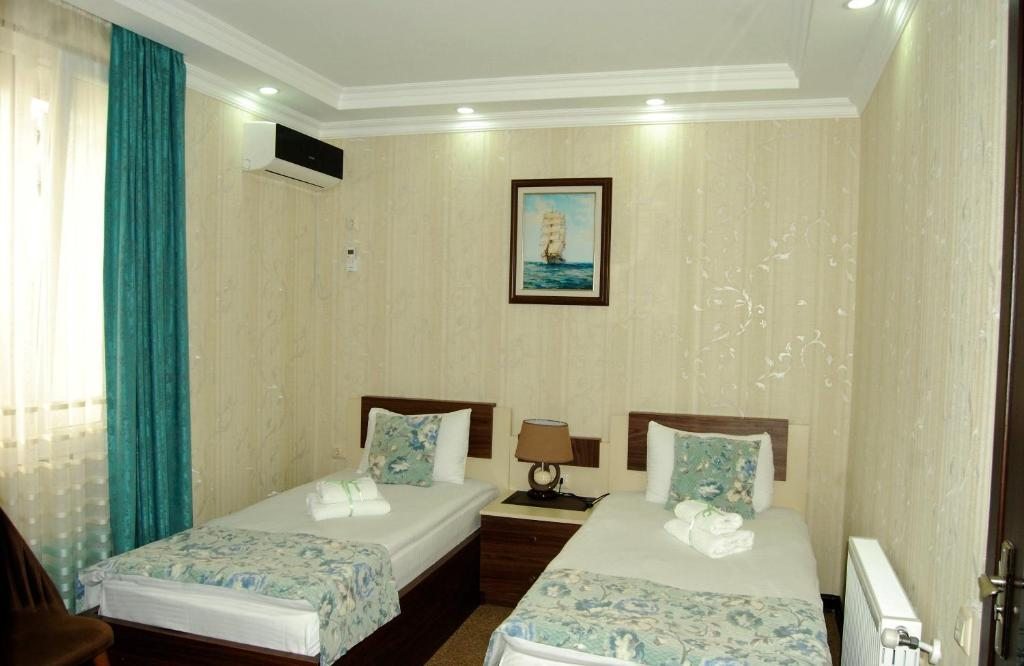 Двухместный (Просторный двухместный номер с 2 отдельными кроватями) отеля Hotel Park, Батуми