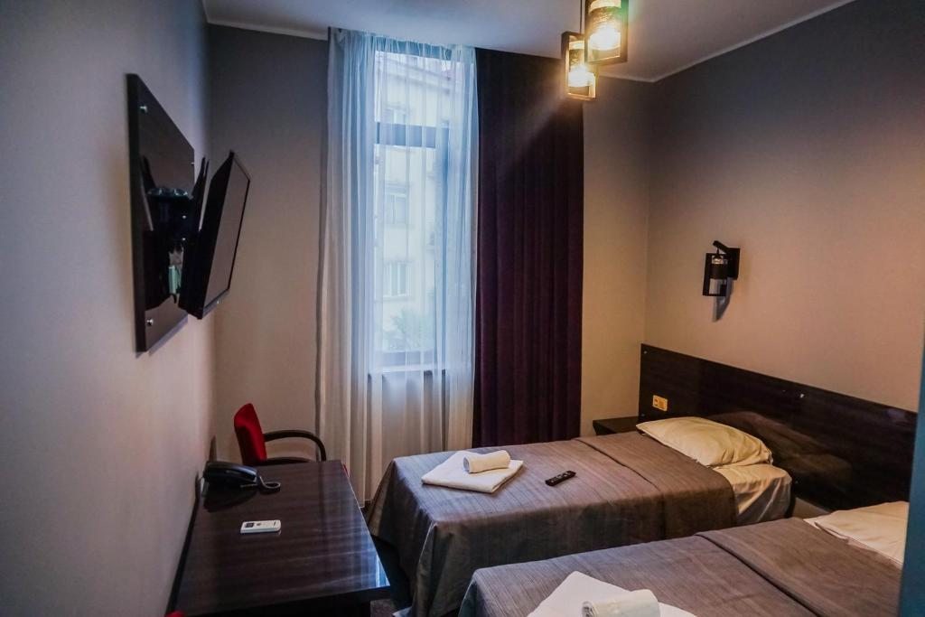 Двухместный (Двухместный номер с 1 кроватью или 2 отдельными кроватями, вид на город) отеля Hotel Poseidon, Батуми