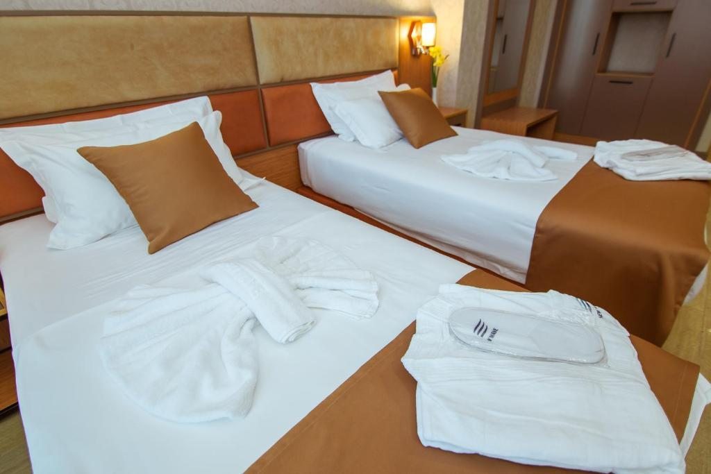 Двухместный (Стандартный двухместный номер с 2 отдельными кроватями) отеля New Wave Hotel, Батуми
