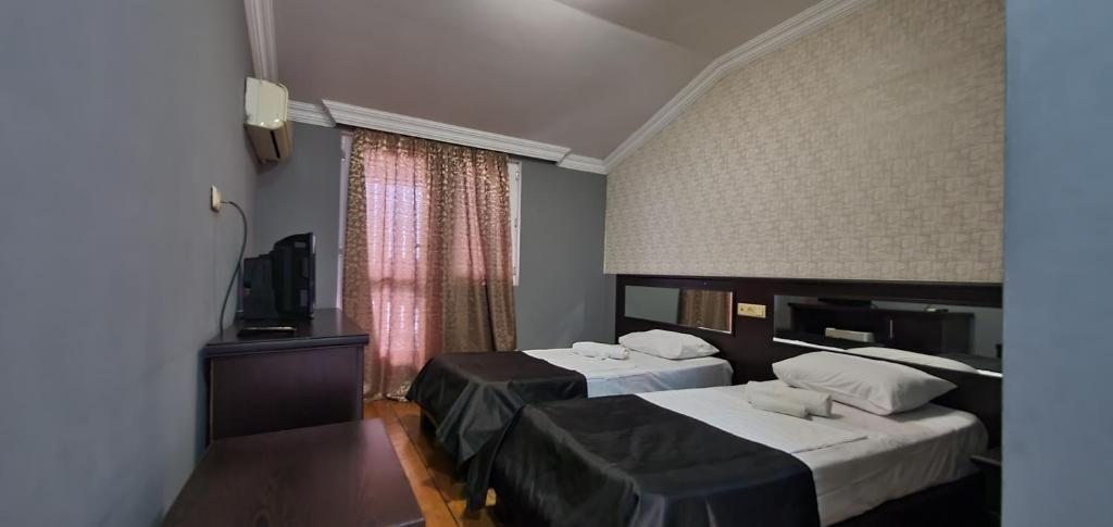 Двухместный (Бюджетный двухместный номер с 2 отдельными кроватями) отеля Terrace, Батуми