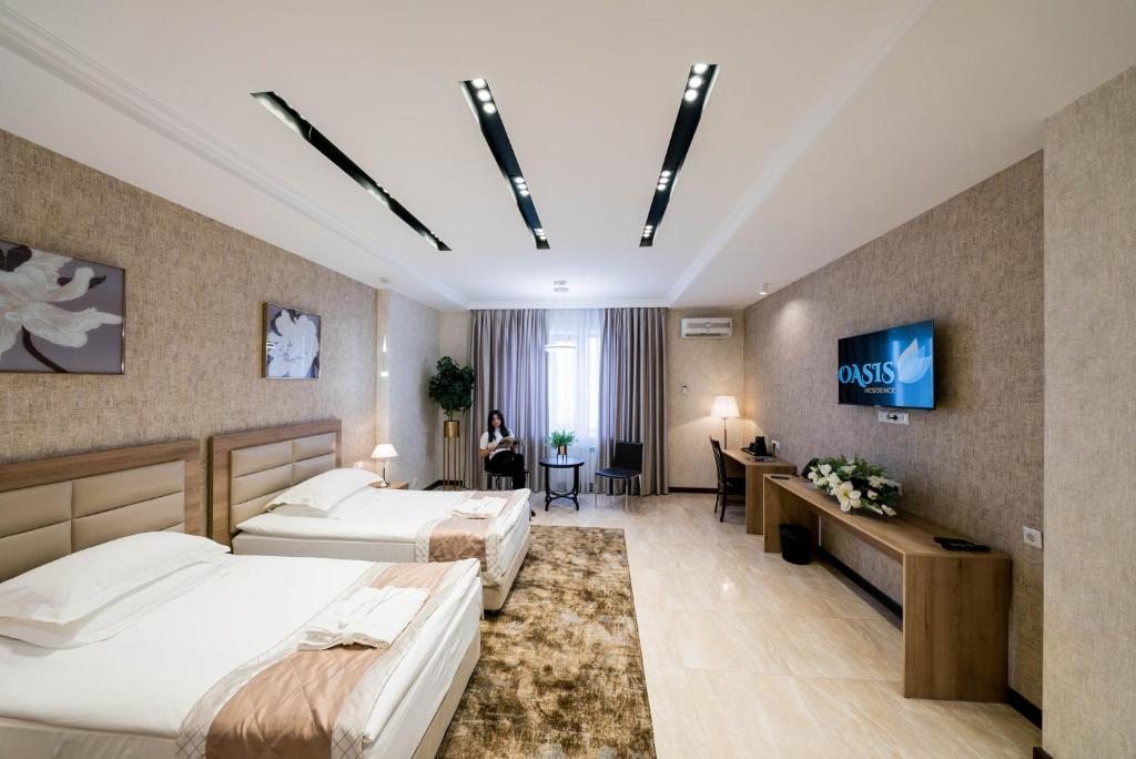 Двухместный (Просторный двухместный номер с 2 отдельными кроватями) отеля Oasis Residence, Бишкек