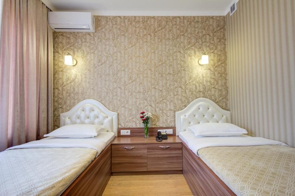 Двухместный (Двухместный номер с 2 отдельными кроватями) отеля Rixon, Бишкек