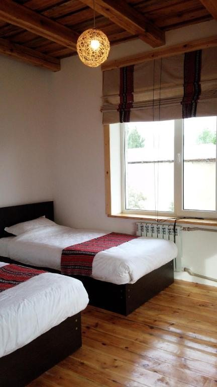 Двухместный (Двухместный номер с 2 отдельными кроватями) гостевого дома Matsunoki, Каракол (Иссык-Кульская область)