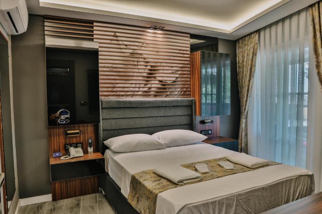 Двухместный (Стандартный двухместный номер с 1 кроватью) отеля çesme marin butik otel, Измир