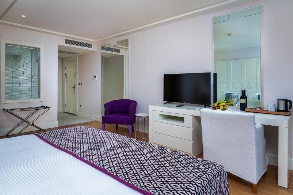 Двухместный (Двухместный номер Делюкс с 1 кроватью) отеля HİLLSTONE BODRUM HOTEL & SPA, Бодрум