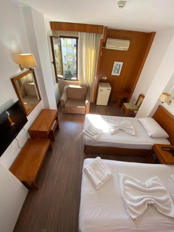 Двухместный (Двухместный номер с 2 отдельными кроватями) отеля Hotel Güleryüz, Анталия