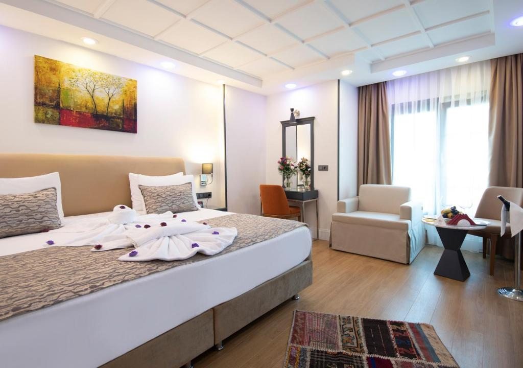 Трехместный (Трехместный номер с диван-кроватью) отеля Antusa Design Hotel & Spa, Стамбул