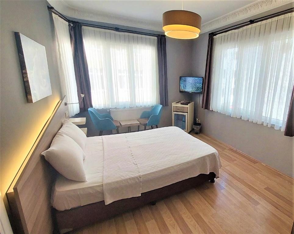 Двухместный (Большой двухместный номер с 1 кроватью) отеля Armoni City Otel, Стамбул