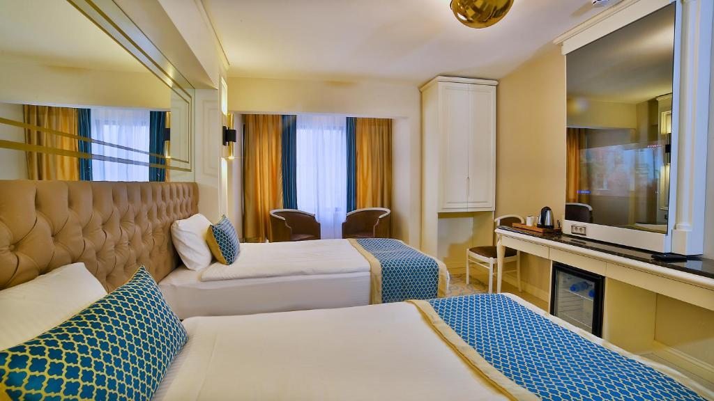 Двухместный (Двухместный номер Делюкс с 1 кроватью или 2 отдельными кроватями) отеля Beethoven Premium Hotel, Стамбул