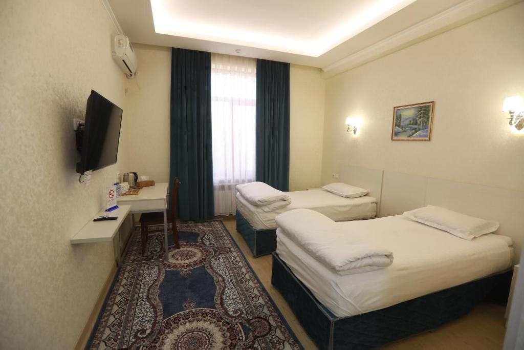 Двухместный (Двухместный номер с 1 кроватью или 2 отдельными кроватями и собственной ванной комнатой) отеля Grand Mumtoz Hotel, Ташкент