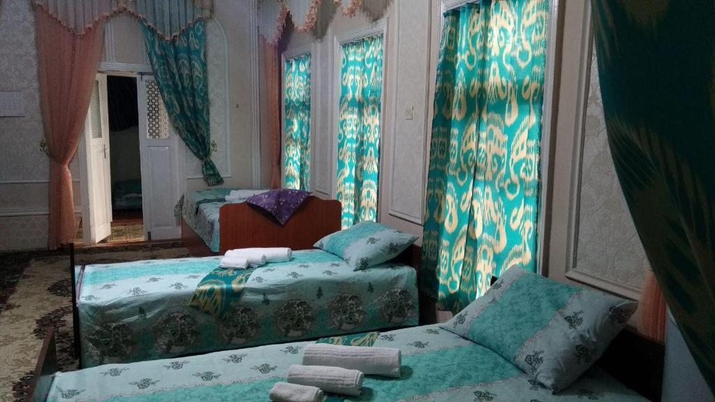 Номер (Кровать в общем номере для мужчин с 4 кроватями) гостевого дома Guesthouse Kamolot, Бухара