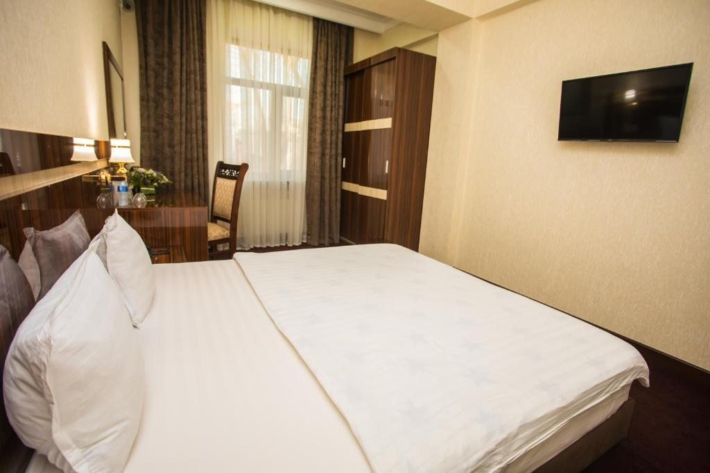 Двухместный (Номер Делюкс с кроватью размера «king-size») отеля Hotel Grand Capital, Ташкент
