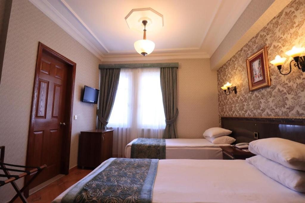 Двухместный (Стандартный двухместный номер с 1 кроватью или 2 отдельными кроватями) отеля Blue House Hotel, Стамбул
