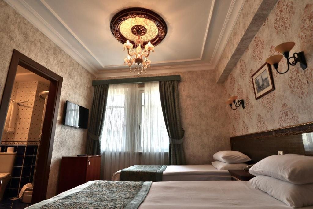 Двухместный (Двухместный номер Делюкс с 1 кроватью или 2 отдельными кроватями) отеля Blue House Hotel, Стамбул