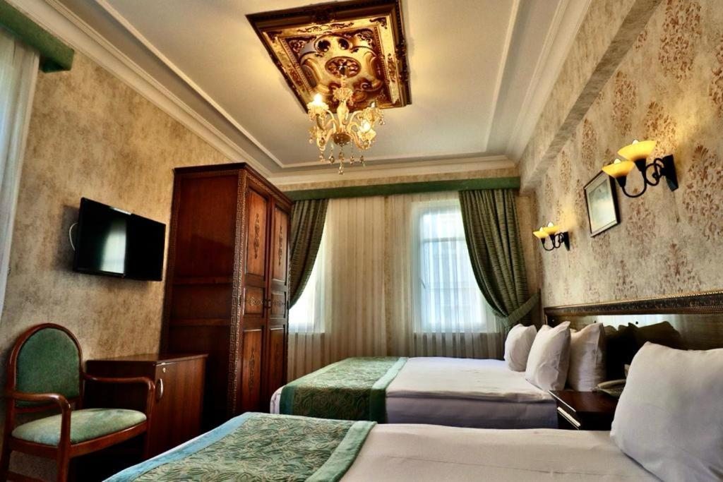 Семейный (Улучшенный семейный номер (с видом на море)) отеля Blue House Hotel, Стамбул