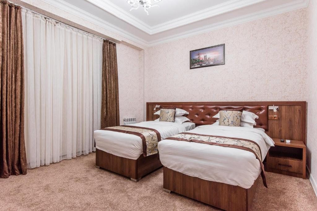 Двухместный (Улучшенный двухместный номер с 1 кроватью или 2 отдельными кроватями) отеля Michelin Hotel, Ташкент