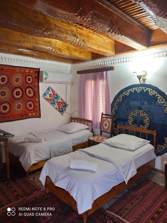 Двухместный (Двухместный номер с 1 кроватью или 2 отдельными кроватями и собственной ванной комнатой) отеля MEKHTAR AMBAR Caravan Sarai XIX, Бухара